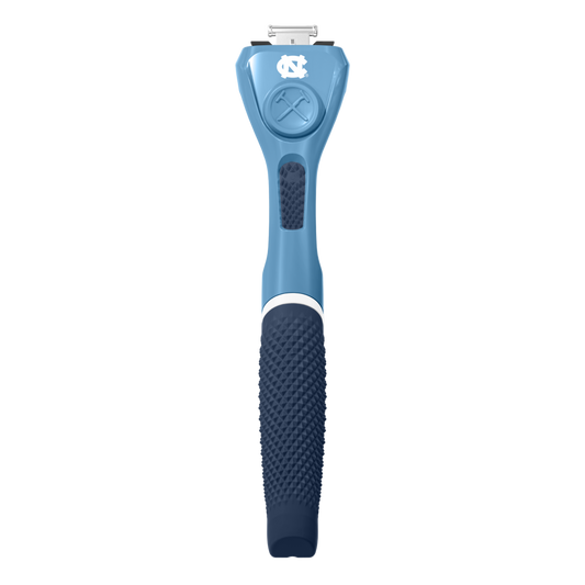 Blue grooming tool with UNC logo on a white background